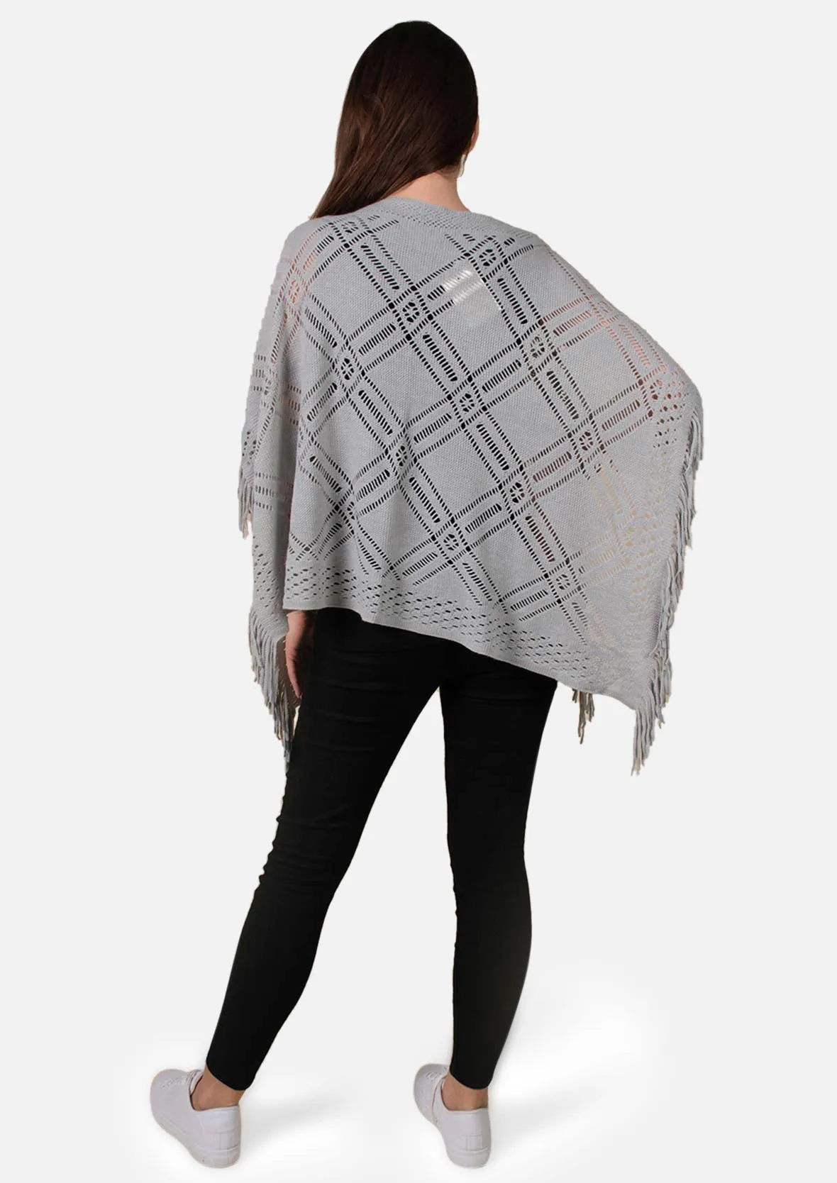 Knitted Poncho With Fringe Detailing